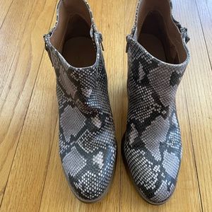 Boots in Snake skin pattern. In excellent condition.